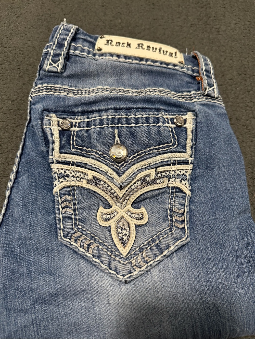 Size 26 Rock Revival Women's Easy Skinny Jean with White Embroidered Back Pocket
